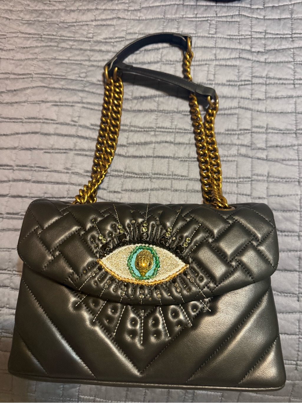 Kurt Geiger Black Quilted Shoulder Bag With Gold Chains And Embroidered Eye